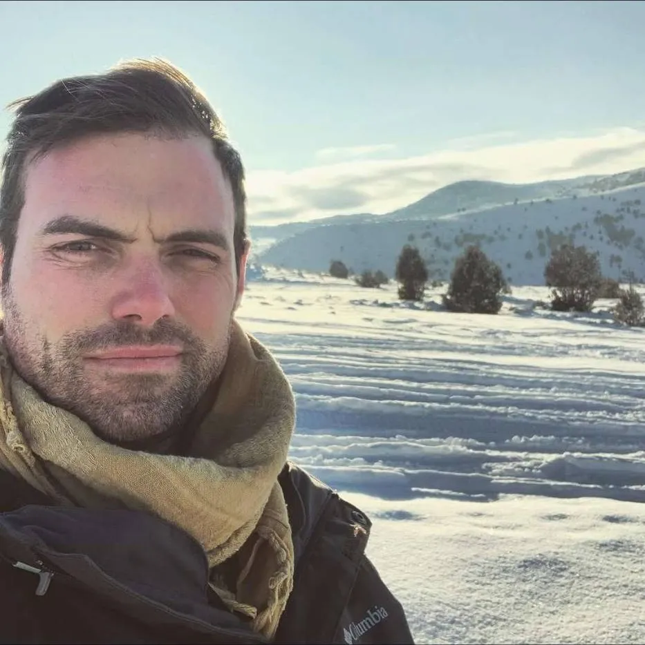 Zach, founder of Grid North, outdoors in winter